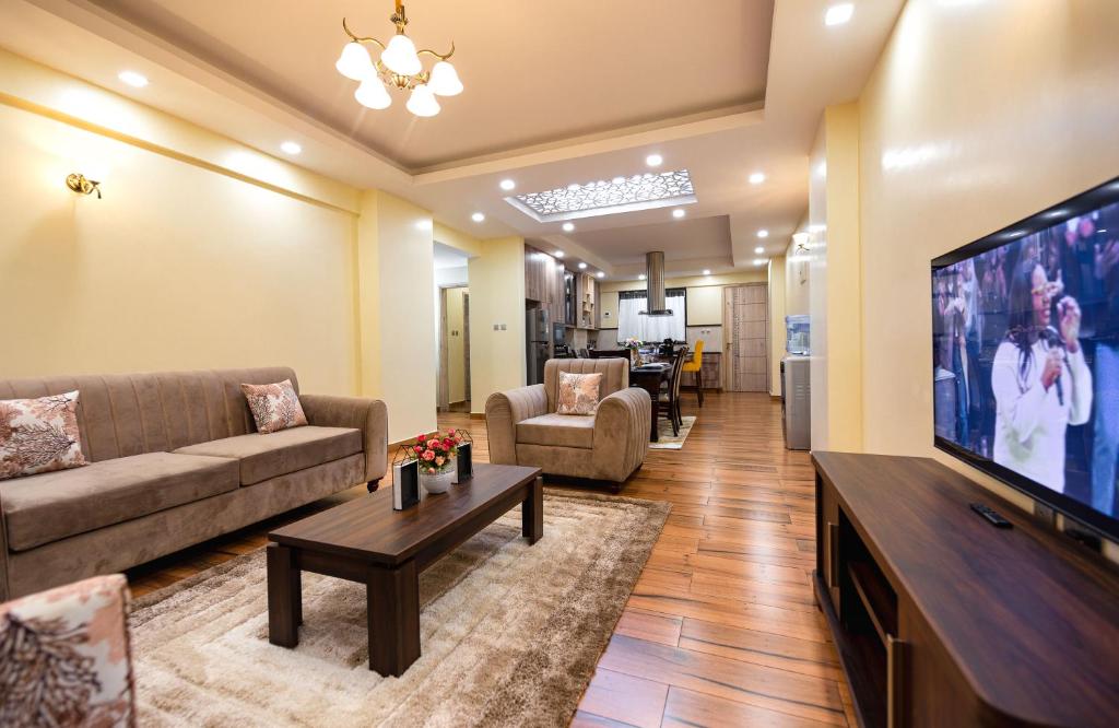 K's Place - Elegant 2 Bedroom Apartment with a Pool & Gym